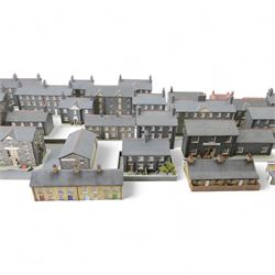 Thirty 00 gauge model railway trackside buildings, six by Martin's Models York including church and terraced houses and twenty-four kit-built examples all grey stone effect houses and farm buildings