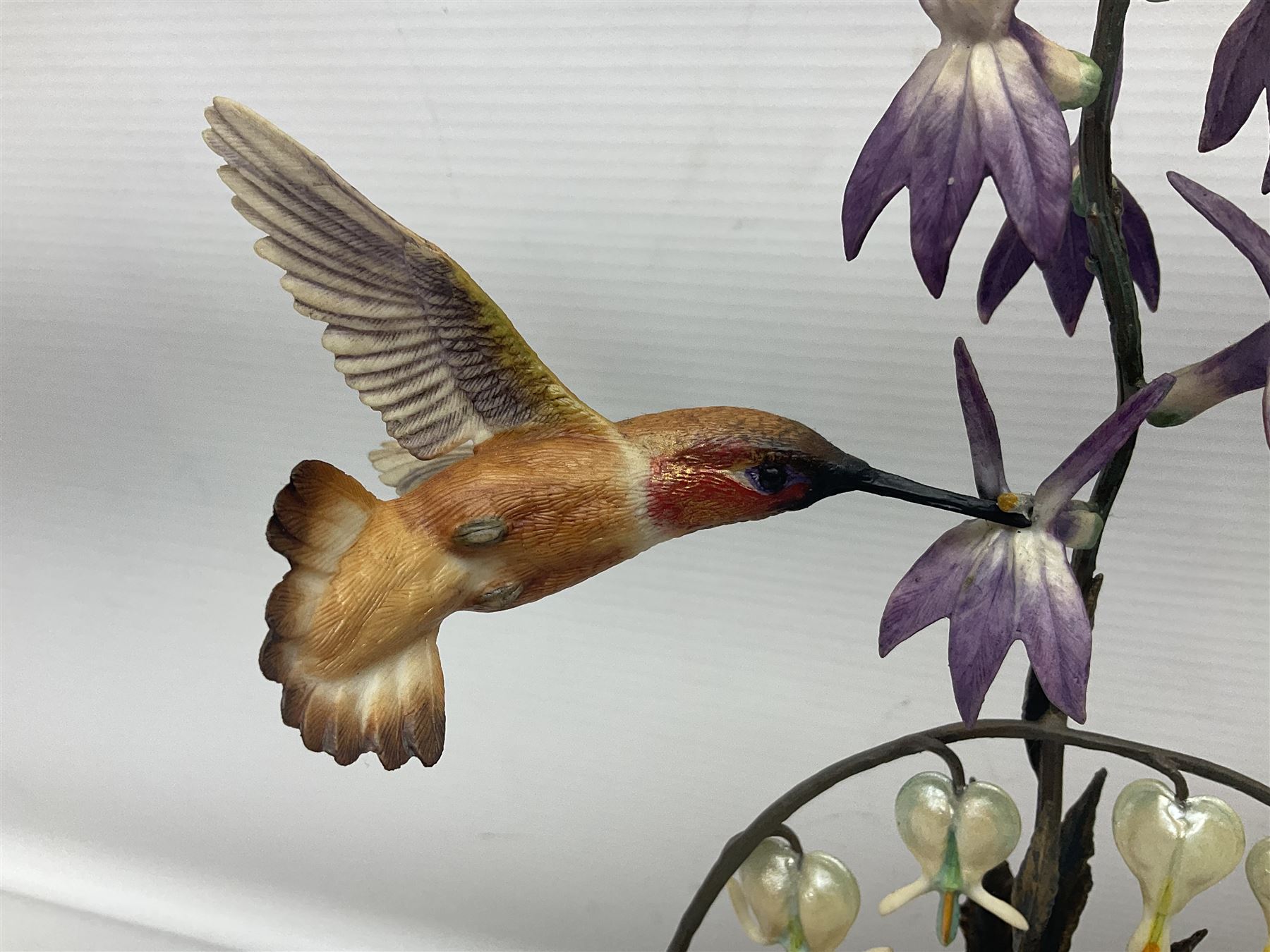 Franklin Mint House of Faberge, four humming bird figure groups, comprising Flight of Fancy, Beauty in Bloom, Splendor in the garden and The Enriched Garden, largest H35cm