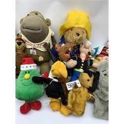 Twenty-one TV and film related and promotional soft toys including Sooty and Sweep hand puppets, Captain Pugwash, Muppets, Yogi Bear, Popeye, Paddington Bear, Zippy, Roland Rat etc