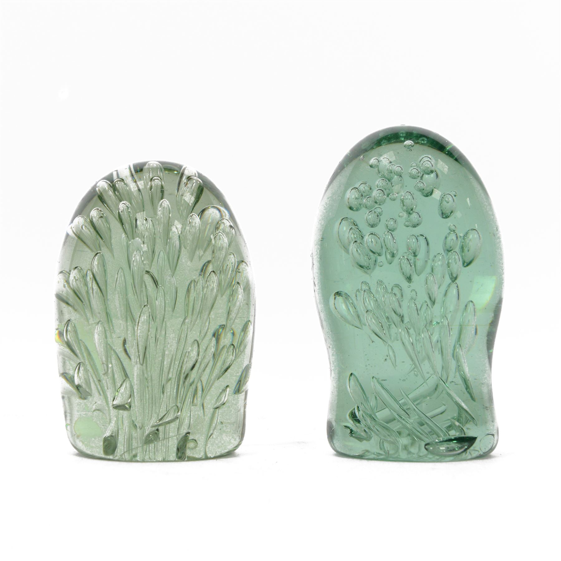 Two Victorian green glass dump paperweights with bubble inclusions, tallest H13cm