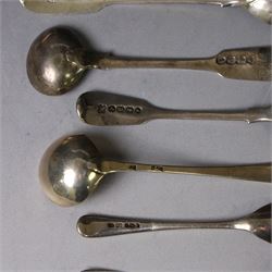 George III silver marrow scoop, hallmarked London 1767, makers mark indistinct, together with a collection of silver condiment spoons and butter knives, all hallmarked