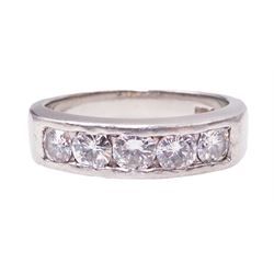 Platinum channel set five stone round brilliant cut diamond ring, Birmingham assay mark, total diamond weight approx 0.65 carat