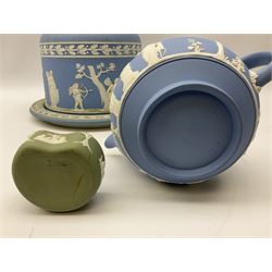 Late 19th century pale blue Wedgwood Jasperware cheese dome with cover, decorated with acorn and oak leaf bands surrounding neo-classical ladies, cherubs, flowers and trees, impressed Wedgwood mark beneath, together with further Wedgwood Jasperware teapots, boxed dishes etc