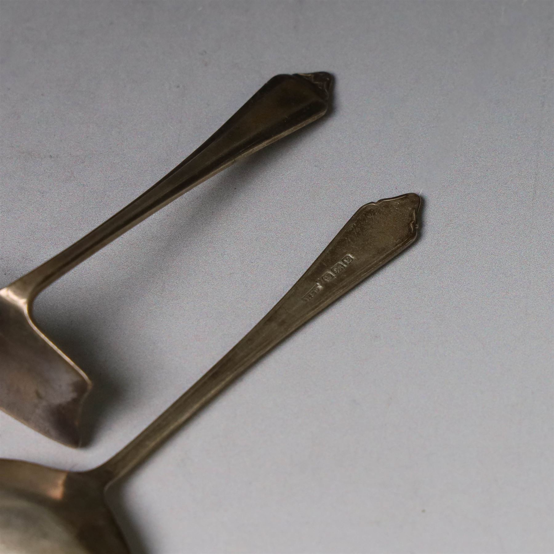Silver Christening set, comprising spoon, fork and mother of pearl handled knife with engraved initials, together with a silver spoon and pusher set, all hallmarked, in fitted cases