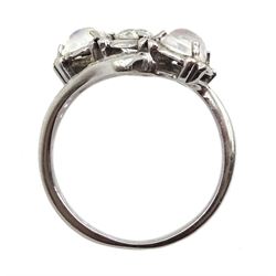 14ct white gold old cut diamond and moonstone crossover ring, central diamond approx 0.55 carat