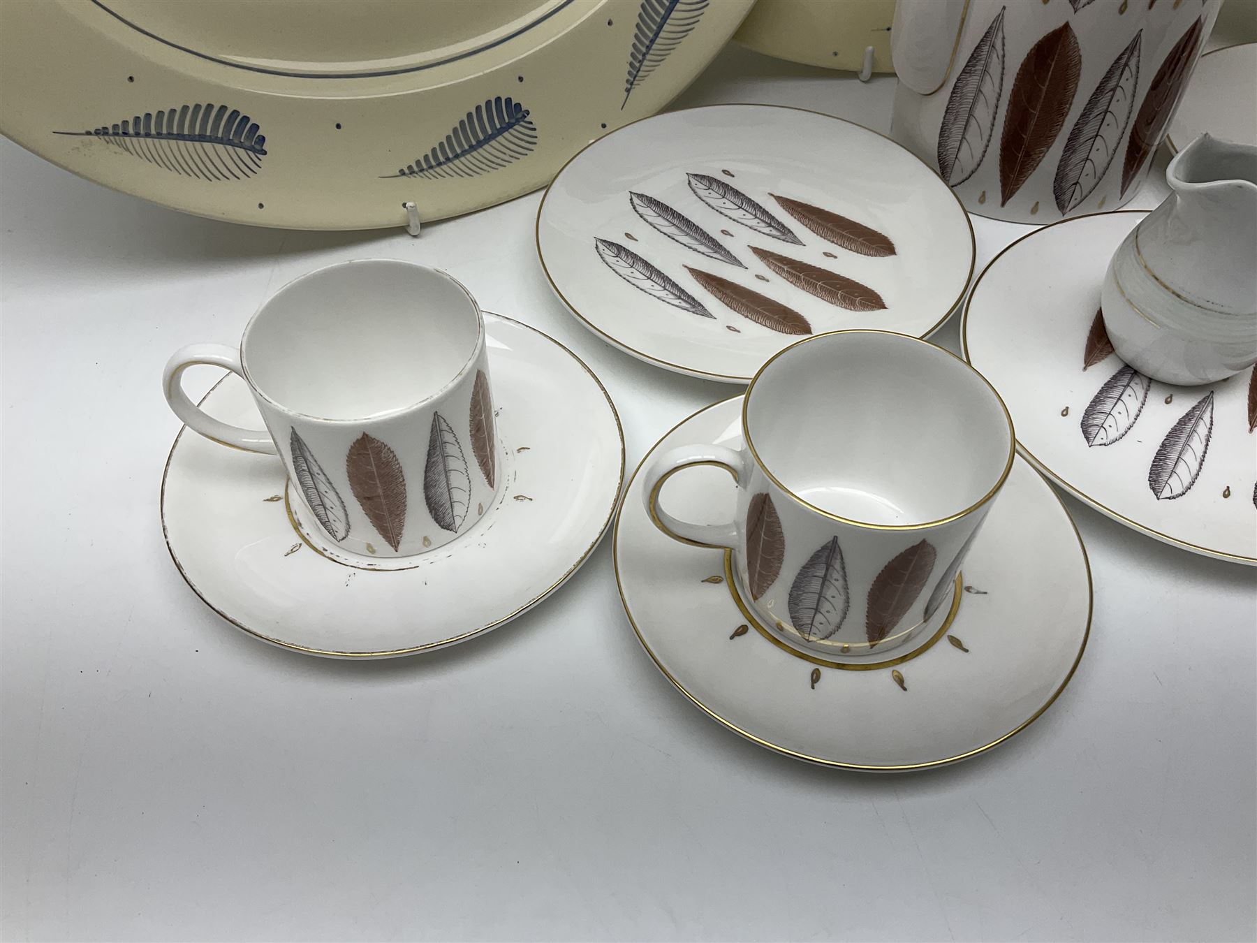 Susie Cooper Hyde Park pattern coffee set, comprising coffee pot, four coffee cans and saucers, dessert plates, together with three plates in a similar design 