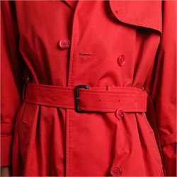 Burberrys and Aquascutum - two vintage trench coats, comprising a Burberrys red cotton trench coat with navy, red and grey check lining, labelled Burberrys, Made in England, and an Aquascutum beige cotton trench coat with house check lining, labelled Aquascutum, Made in England, both size L (2)
