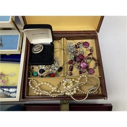 Collection of costume jewellery and wristwatches including two Amelia Carter quartz ladies wristwatches, cross pendant on silver chain, Celtic design brooches etc in a selection of jewellery boxes 