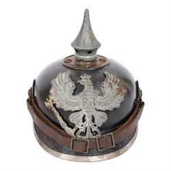 WWI Prussian M1915 Pickelhaube, the black leather skull with removable steel spike finial,...