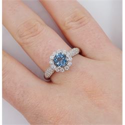 Silver blue topaz and cubic zirconia cluster ring, stamped 925