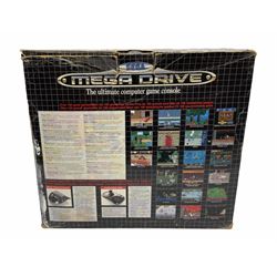 1990s Sega Megadrive 16bit games console with five games comprising Sonic the Hedgehog, Fifa International Soccer, Mickey Mouse Castle of Illusion, MicroMachines 2 Turbo Tournament and 1994 Lillehammer Winter Olympics, boxed with instructions