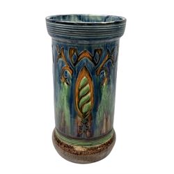 Majolica stick stand of cylindrical form in orange, green, blue and brown glaze, H53.5cm