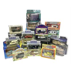 Twenty-six TV/Film related die-cast models by Corgi, Jada, Lledo etc including Kojak, Heartbeat, Casualty, Londons Burninng, Darling Buds of May, Harry Potter, Back To The Future, Top Gear, Bullitt etc; all boxed (26)