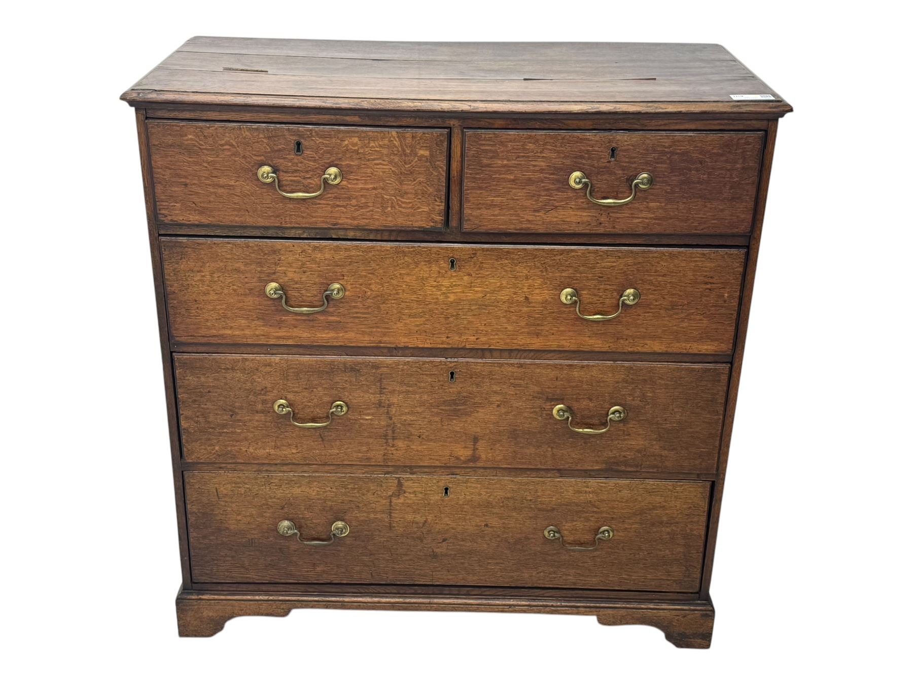 19th century oak chest, rectangular top over two short and three long drawers, on bracket feet