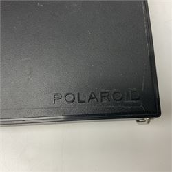 Zenza Bronica ETRS camera body, safari edition, serial no. 7100811, with 'Zenza Bronica Zenzanon EII 1:2.8 f=75mm' lens, serial no. 7908591, film magazine back, safari, serial no. 8100564, AE-ii metering head, safari, serial no. 617024, etc, all in leather case