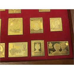 Danbury Mint sterling silver hallmarked stamp ingot set of twenty-five, housed in a fitted wooden case