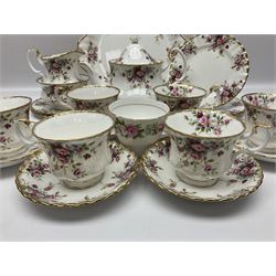 Royal Albert Cottage Garden pattern tea service for six people, comprising teapot, milk jug, sugar bowl, teacups and saucers, side plates and cake plate, all with printed mark beneath