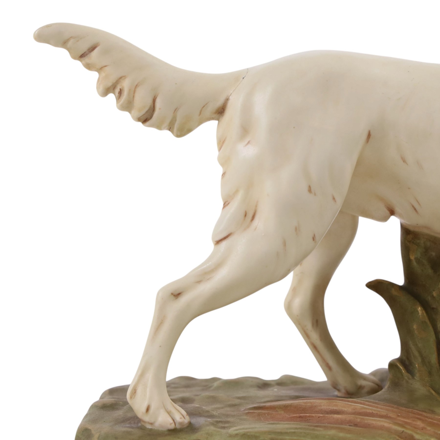 Royal Dux model of a hunting dog, with bird in mouth, upon gilt and green rustic base, marks beneath impressed  1193 and bearing pink applied Royal Dux triangle 