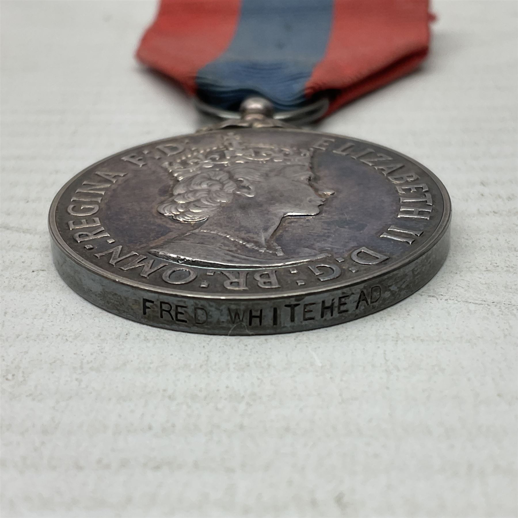 Two Imperial Service Medals to Elsie Hannah Ferguson and Fred Whitehead; each in original case; WWI Special Constabulary Medal to Inspr. Alfred W. Thompson; modern Prisoner of War Medal; cased; replica Victoria Cross and India Mutiny Medals with archive of information relating to Pte. Robert Newell V.C. 9th Lancers; replica Victoria Cross and George Cross with miniatures; and other replica medals etc