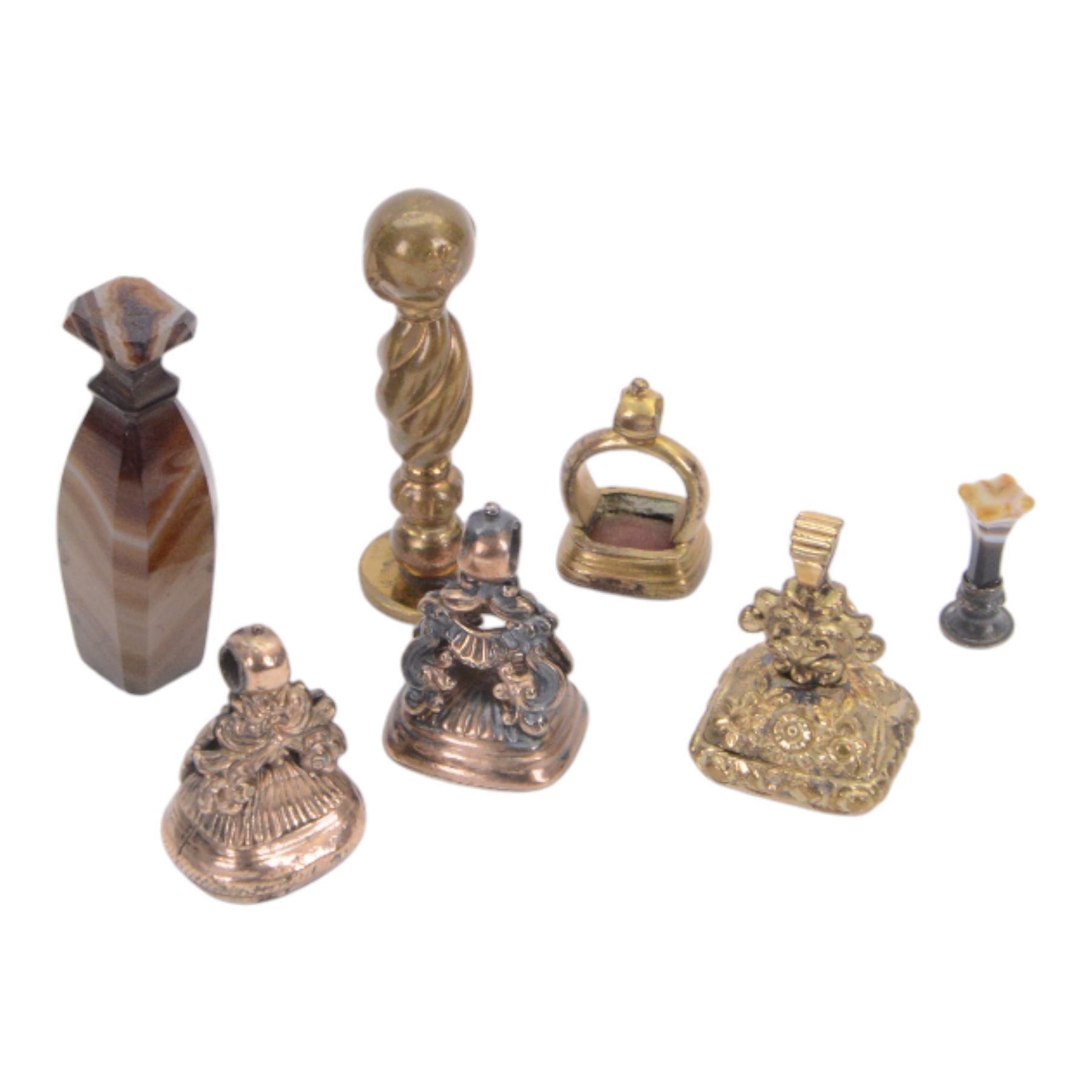 Collection of four 19th century gold plated seals with carnelian matrixes, together with three seals including an agate example, largest seal H3.5cm