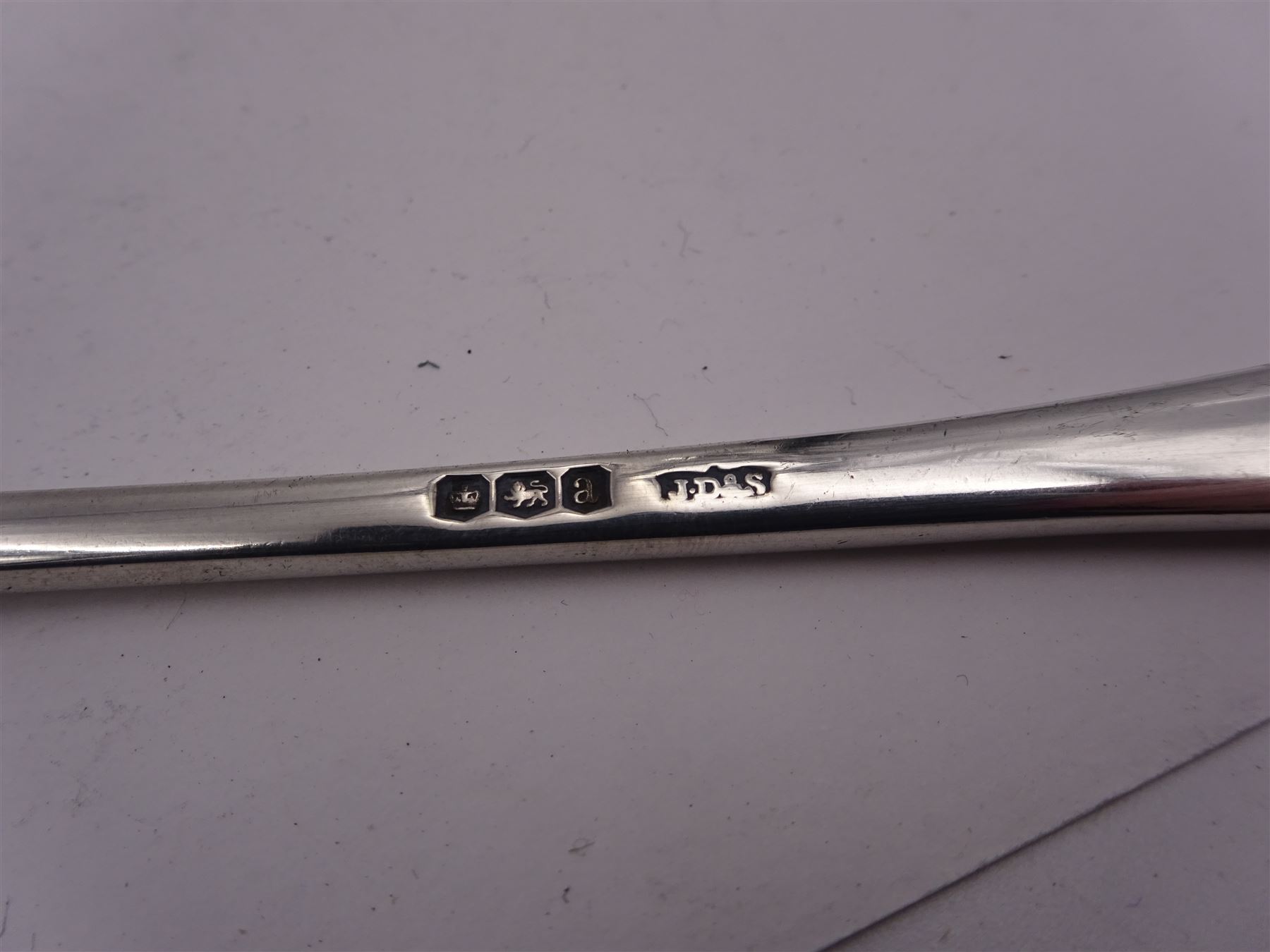 Pair of early 20th century silver salad servers, both with shaped bowls and fluted handles, hallmarked James Dixon & Sons Ltd, Sheffield 1918