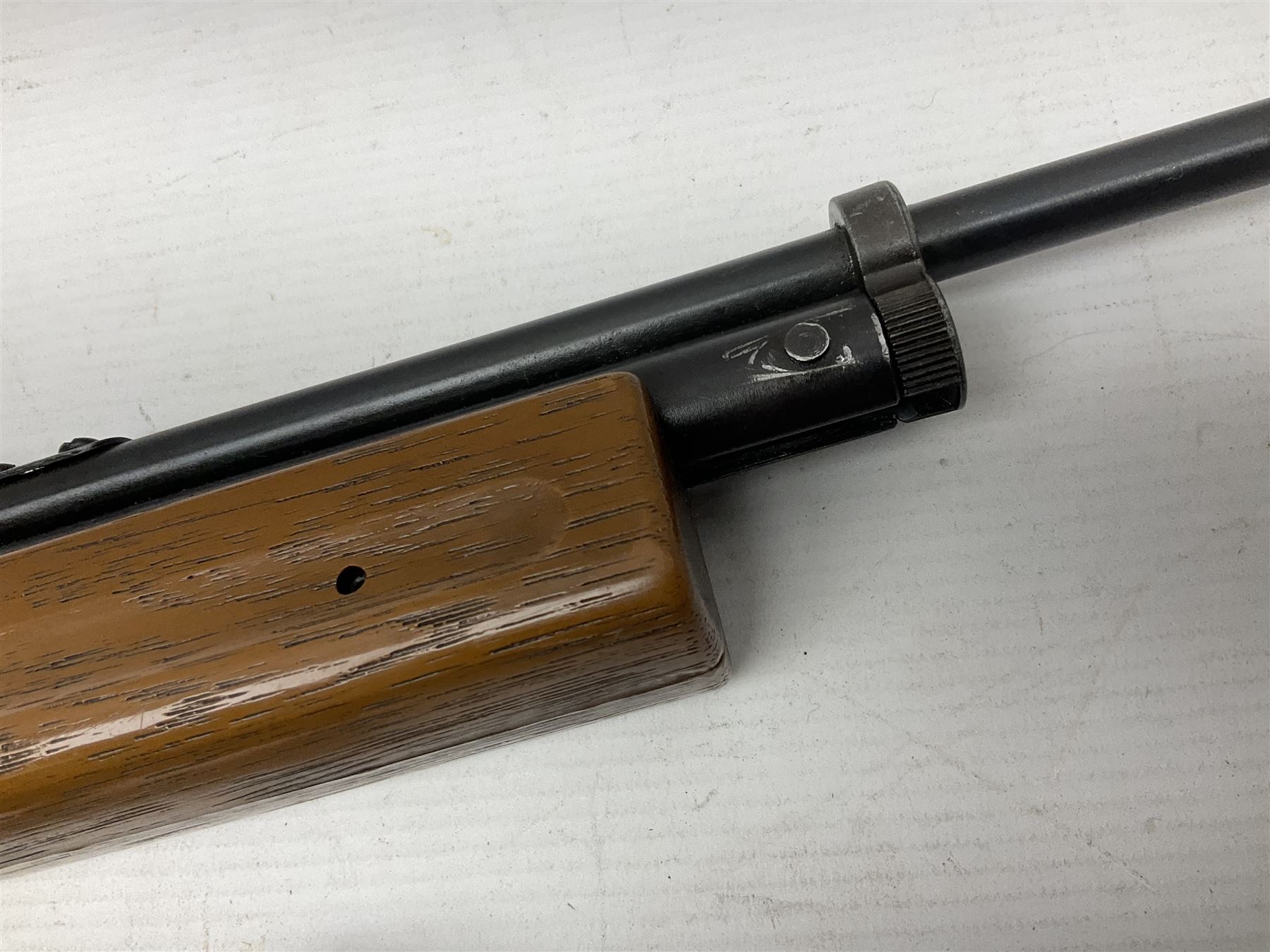 Crosman 760 .177 cal. Junior air rifle with under lever faux pump action and simulated wooden fittings; serial no.278047476, L90cm overall; and SMK B1 Synthetic .22 cal. Youth's air rifle with break-barrel action and 4 x 20 scope; serial no.1721229956084915F, L98.5cm overall (2)  NB: AGE RESTRICTIONS APPLY TO THE PURCHASE OF AIR WEAPONS.