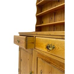 Solid pine dresser, fitted with two drawers and cupboards, with plate rack