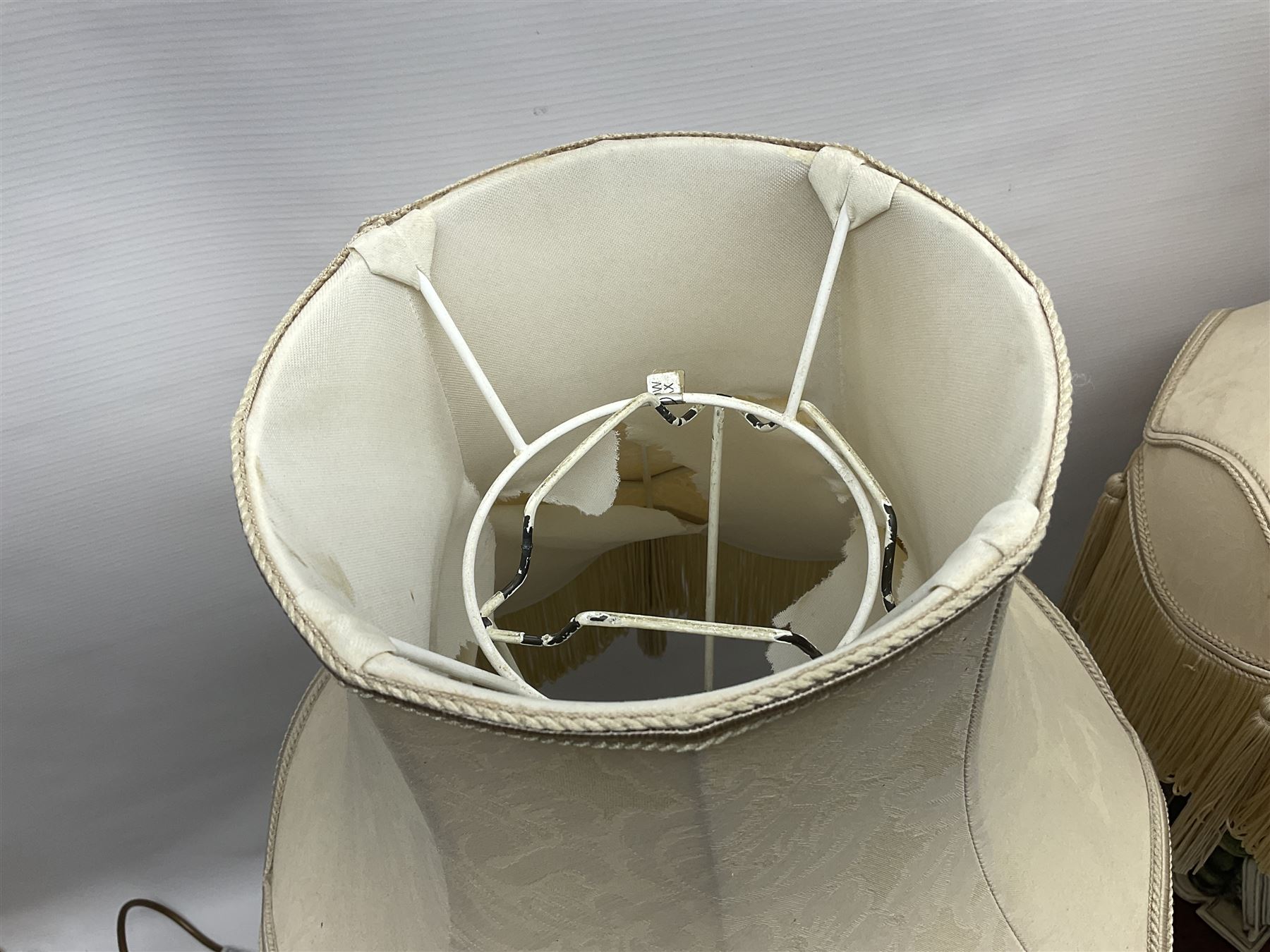 Two Giuseppe Armani figural lamps, the first modelled as an owl perched upon a book, the second modelled as a pair of owls perched upon blackberry branch, each with damask fabric tassel shades, tallest H76cm