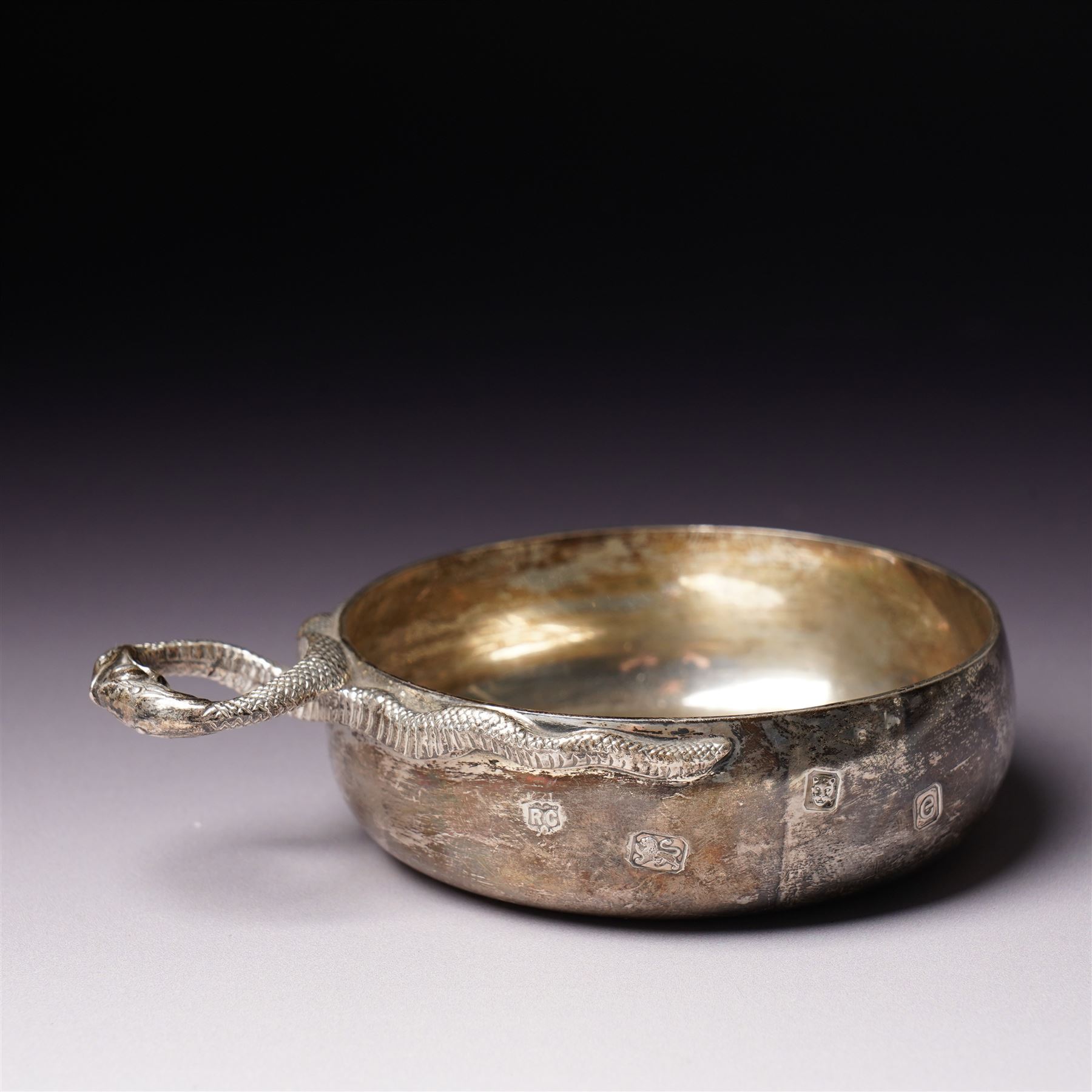 Elizabeth II silver tasse de vin with entwined snake handle London 1960 Maker William Comyns & Sons Ltd