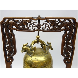  Early 20th century Chinese Temple Gong with brass bell shaped gong decorated with figures & moulded Dragon handle, within a finely carved frame modelled as two opposed dragons chasing the flaming pearl H44.5cm x W24cm   
