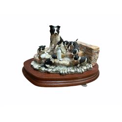 Border fine arts figure, Border collie, model no MT07, by M Turner H22cm, along with Border fine arts figure Spilt milk, model number JH99, by Ray Ayres H15cm.