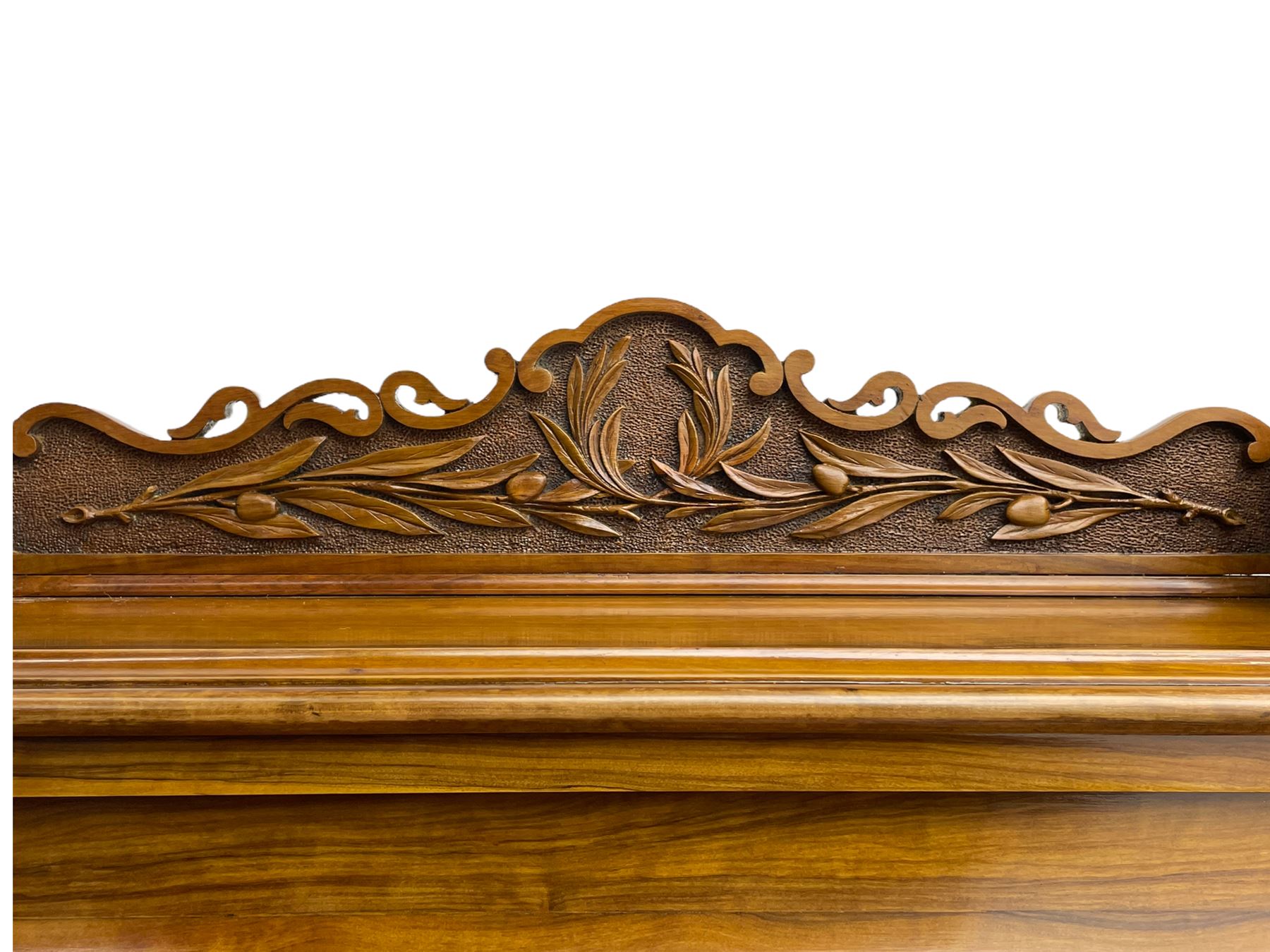 Fine and unusual 19th century olivewood piano top davenport, raised shaped back carved with olive branches and olives, the top hinges to reveal lidded and correspondence compartments, the piano lid enclosing sliding top with hinged and adjustable writing surface with leather inset, right-hand panelled door enclosing four drawers, olive branch and scroll carved cabriole front supports on moulded and shaped platform, turned cup feet with recessed castors 