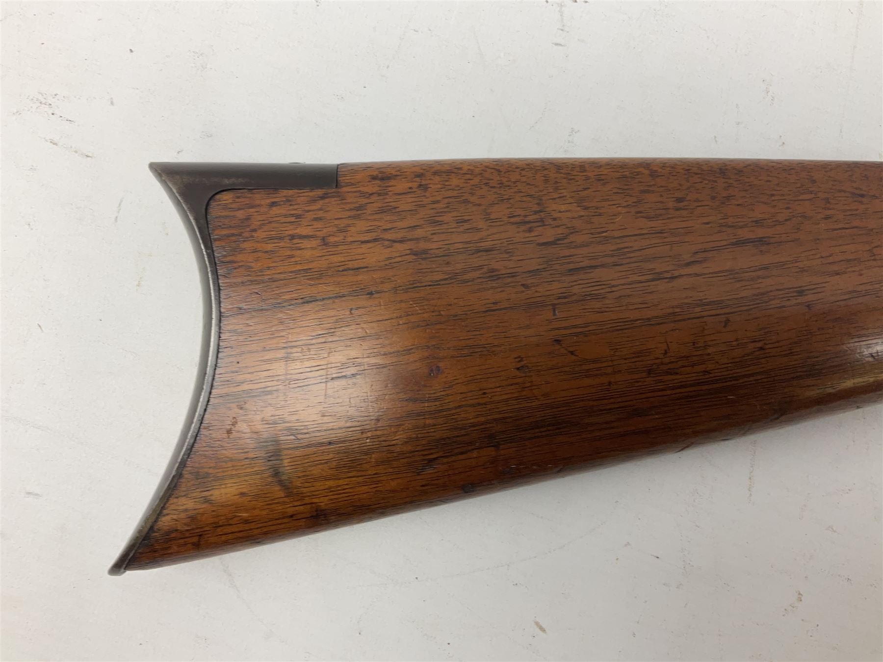 Marlin Firearms Co. USA 'Safety' .32 rim-fire rifle dated 1892, the 61cm barrel with magazine tube under, walnut stock with under lever cocking and crescent butt plate, serial no.153534, L103.5cm