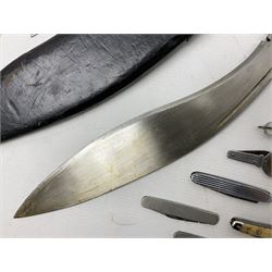 WW2 Gurkha Kukri knife with 34cm curving steel blade and horn handle; in leather covered scabbard with dual belt loops and two horn handled skinning knives L47cm overall; and collection of fourteen military and other folding and pocket knives including WW2 British Army clasp jacknife, J.H. Thompson C.C.1286 army knife dated 1954, Brookes & Crookes multiblade pocket knife etc (15)
