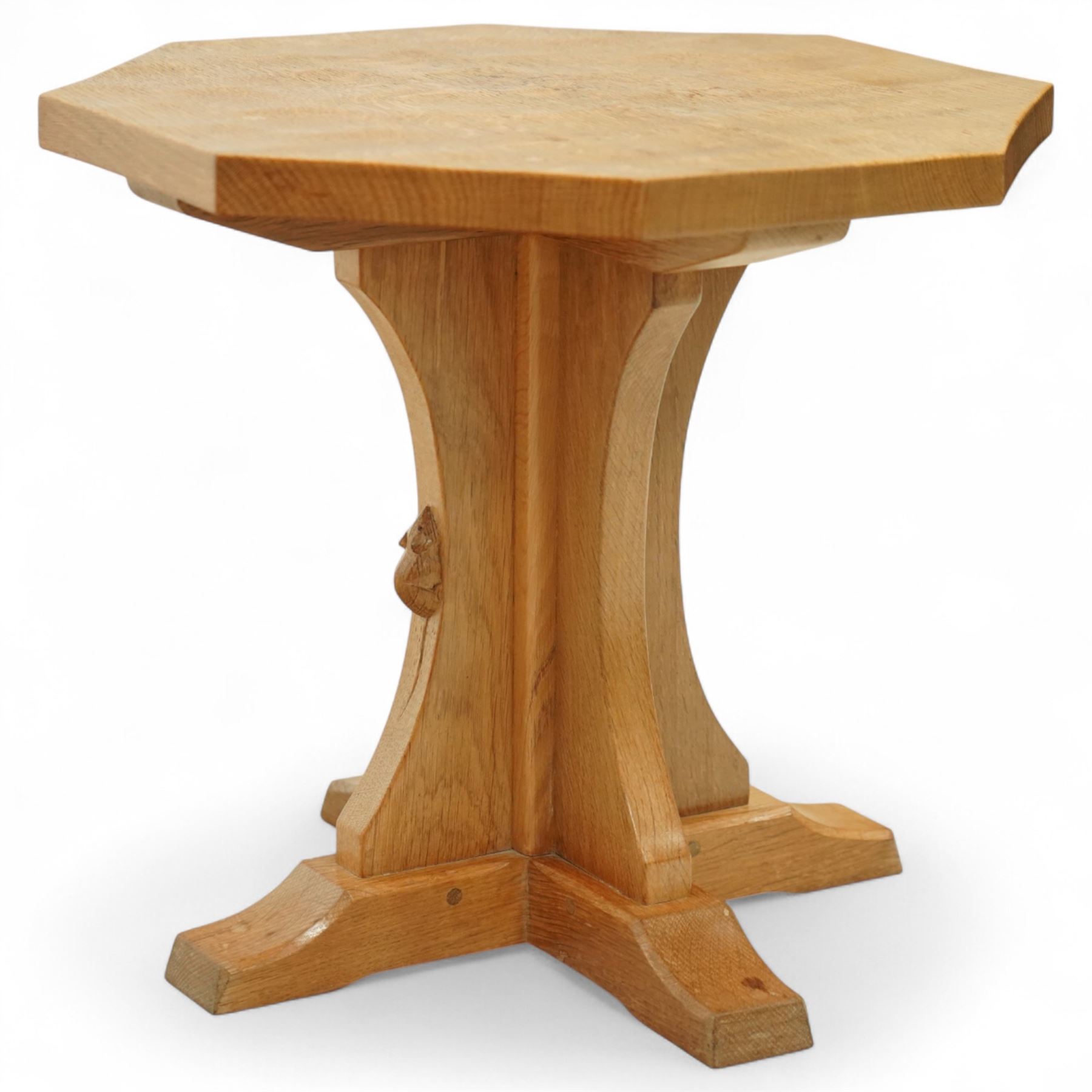 Mouseman - octagonal occasional table, raised on a cruciform base with arched supports, carved with signature mouse to one side, by the workshop of Robert Thompson, Kilburn