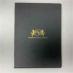 Great Britain King George V 1929 Postal Union Congress one pound stamp, halfpenny green, penny scarlet, one and a half pence purple-brown and two and a half pence blue, all unused, housed in a Harrington and Byrne folder