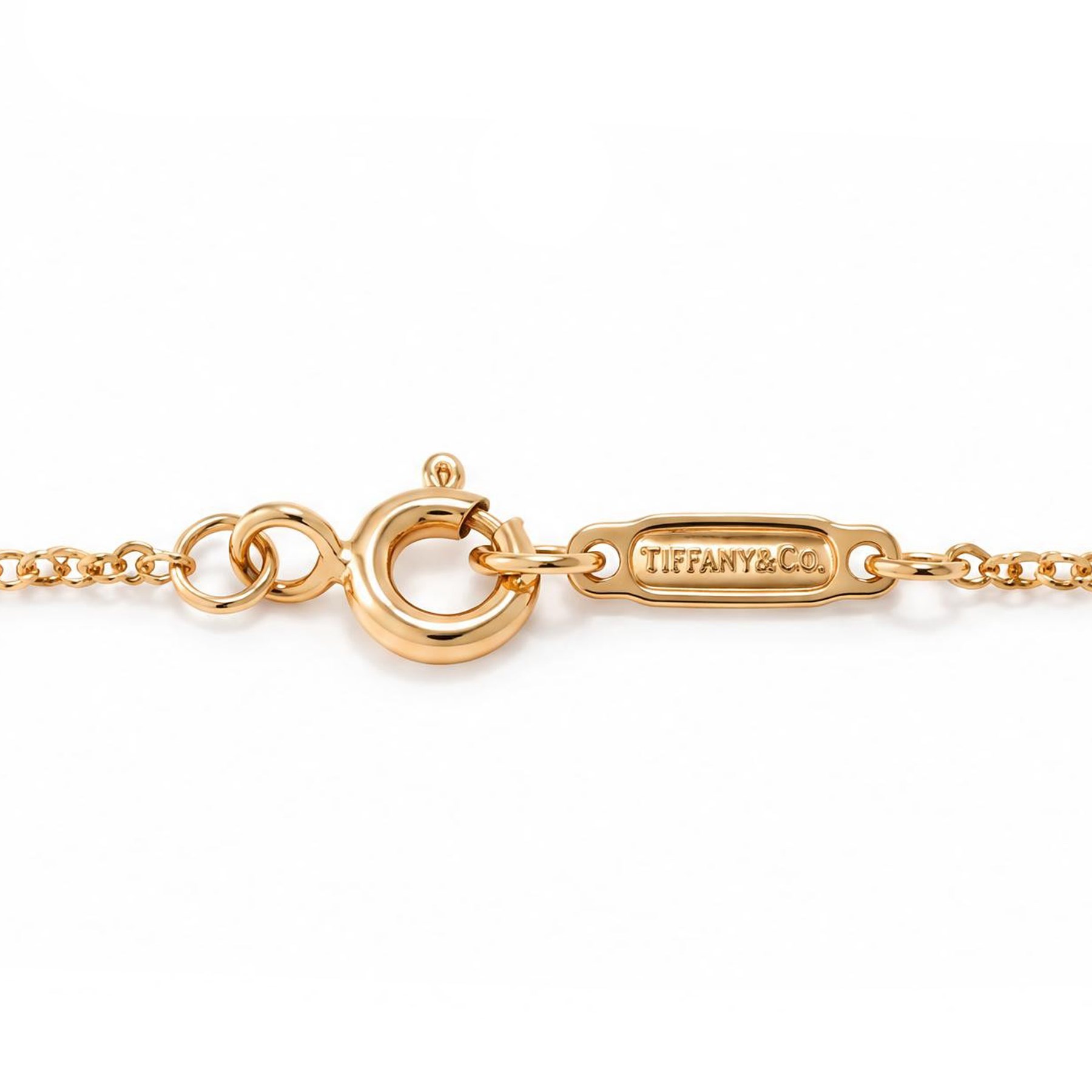 Tiffany & Co. 18ct gold 'Mini Metro' diamond heart pendant, stamped 750, boxed