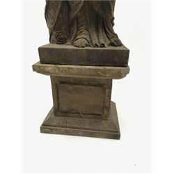 Hand carved stone classical female figure carrying flowers on plinth base