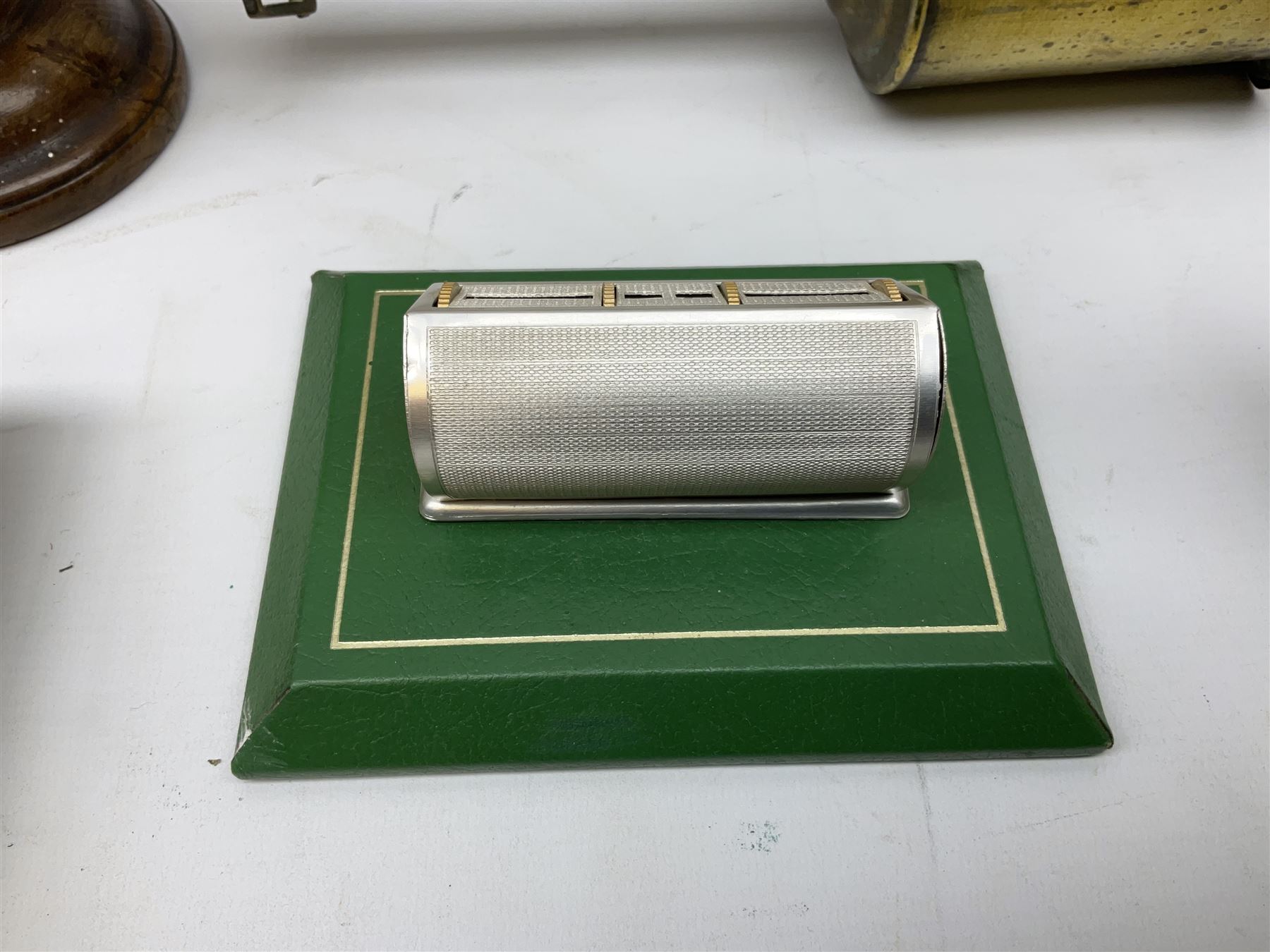 Olive wood lidded urn/vase, brass inkwell, Art Deco style perpetual desk calendar, leather bound Chesterman tape measure, brass roasting spit, Punch Magazines etc