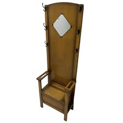 Early 20th century oak hallstand, fitted with mirror and hooks, hinged box seat 