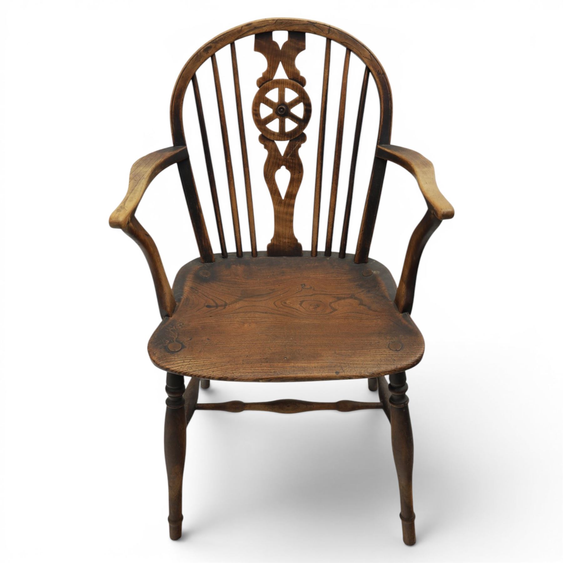 Late 19th century elm and ash low-back Windsor chair, swept arms raised on turned supports  united by H-stretcher
