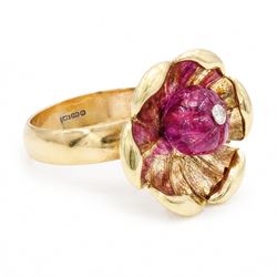 14ct gold ruby and diamond flower head ring, carved ruby set with a single round brilliant cut diamond, on a 9ct gold shank, hallmarked