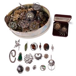 Silver brooches, including Baltic amber, moss agate and modernist examples, together with a large collection of costume brooches