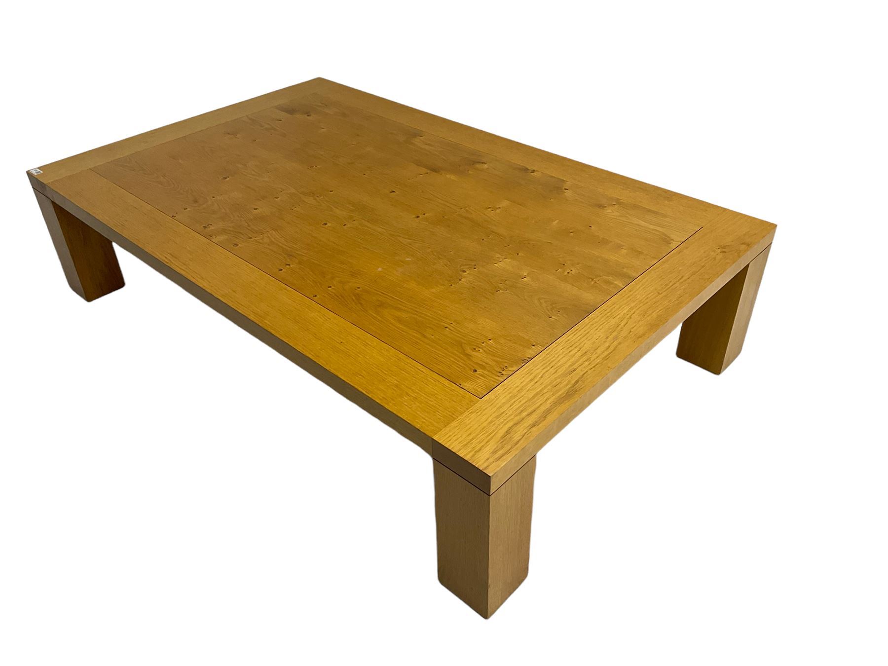 Large pippy oak rectangular coffee table, square block leg, retailed by Chapmans of Newcastle