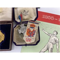 Four white metal 'Men in Space' medallions in original case; Victorian 1898 presentation trade medallion in case; Victorian 1897 Sheffield Visit medallion; two early mobile phones; postcards; and other items