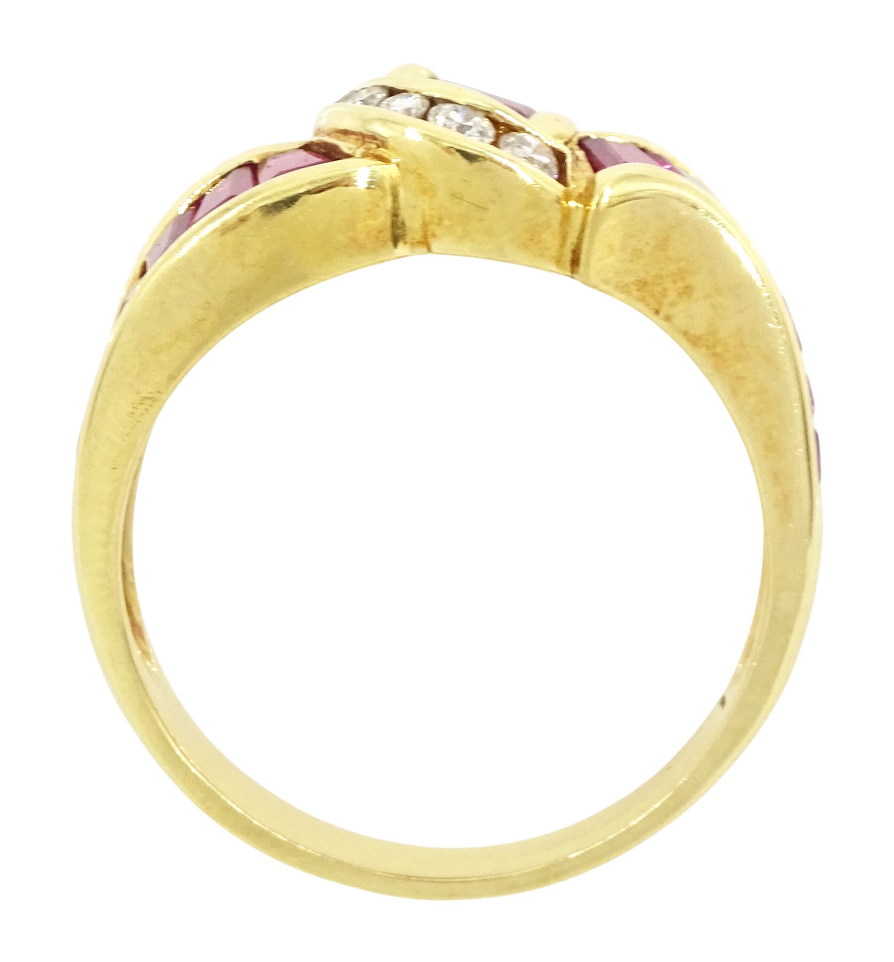 18ct gold ruby and diamond crossover ring, channel set with fifteen calibre cut rubies and seven graduated brilliant cut diamonds