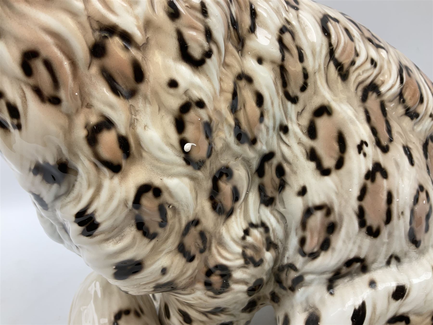 Ronzan fireside model of a snow leopard, with printed mark beneath, H38cm 