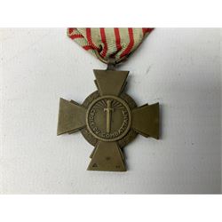 Five continental medals - WW1 Belgian Cross of Fire; WW1 French Croix De Guerre; French Croix De Combattant; French Republic Workers silver merit awarded to L. Mounet 1950; and boxed French Palmes Universitaires Officier d'Academie silver and enamel wreath (5)
