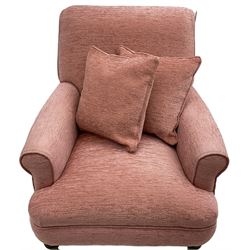 Victorian design armchair, rolled back and arms, upholstered in salmon pink fabric with two scatter cushions (W77cm, H82cm, D94cm); matching rectangular footstool (60cm x 41cm, H28cm)