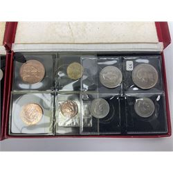 Four King George VI 1950 specimen coin sets, each comprising farthing, half penny, penny, threepence, sixpence, English  one shilling, Scottish one shilling, two shillings and half crown, each in red Royal Mint card case